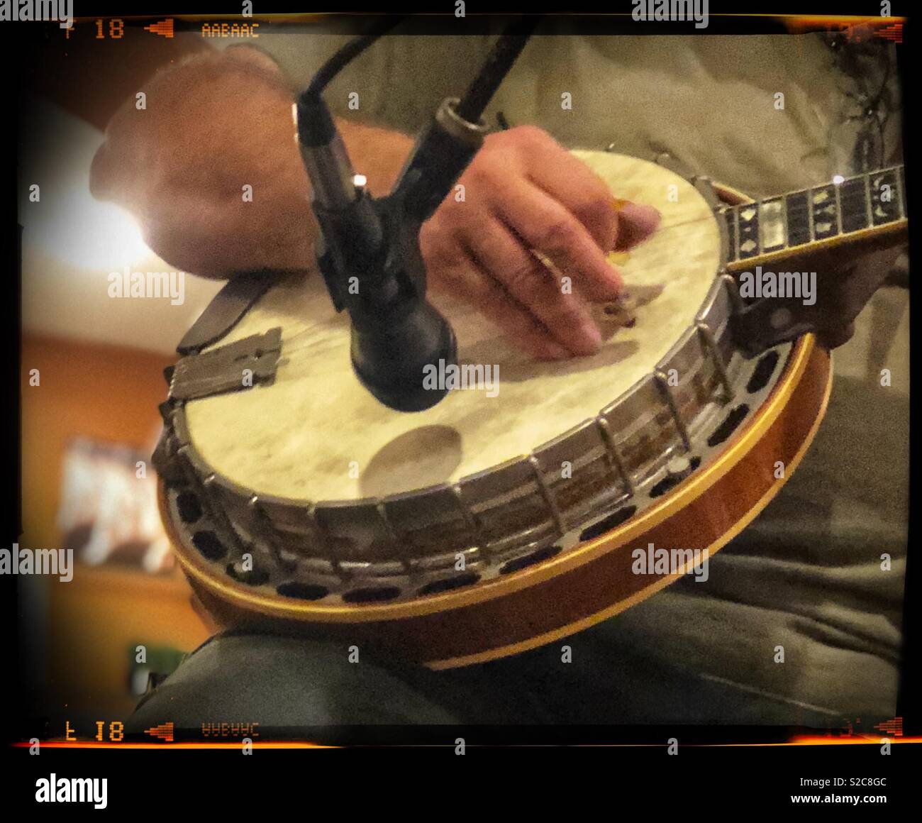 Man strumming banjo Stock Photo Alamy