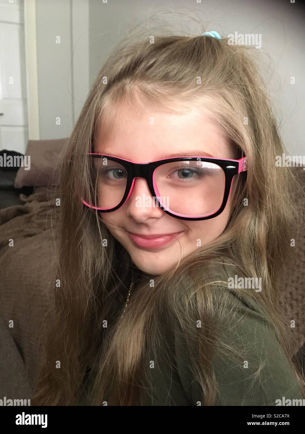 Girl wearing glasses Stock Photo Alamy