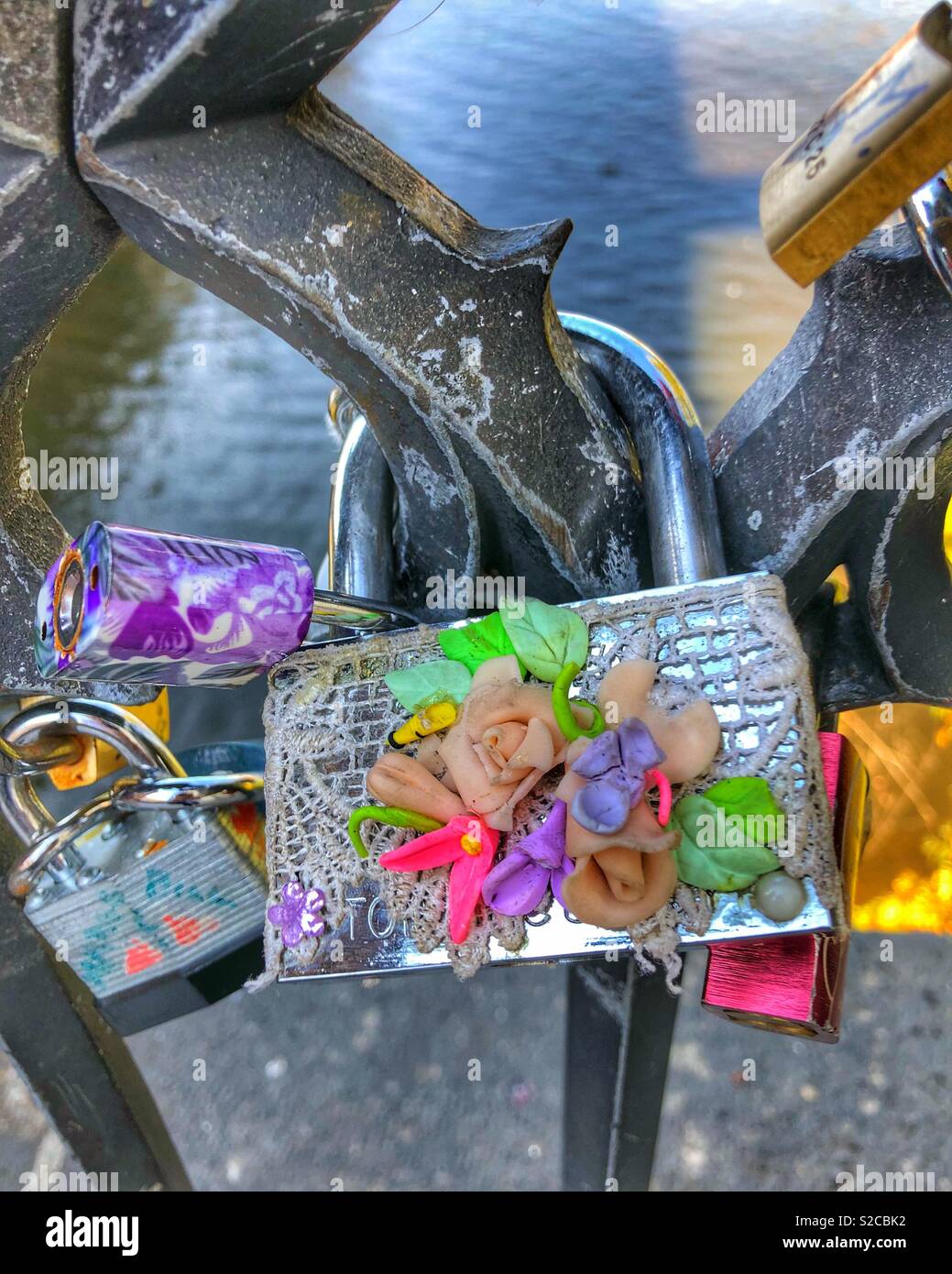 A colourful love lock on a Prague bridge. Stock Photo