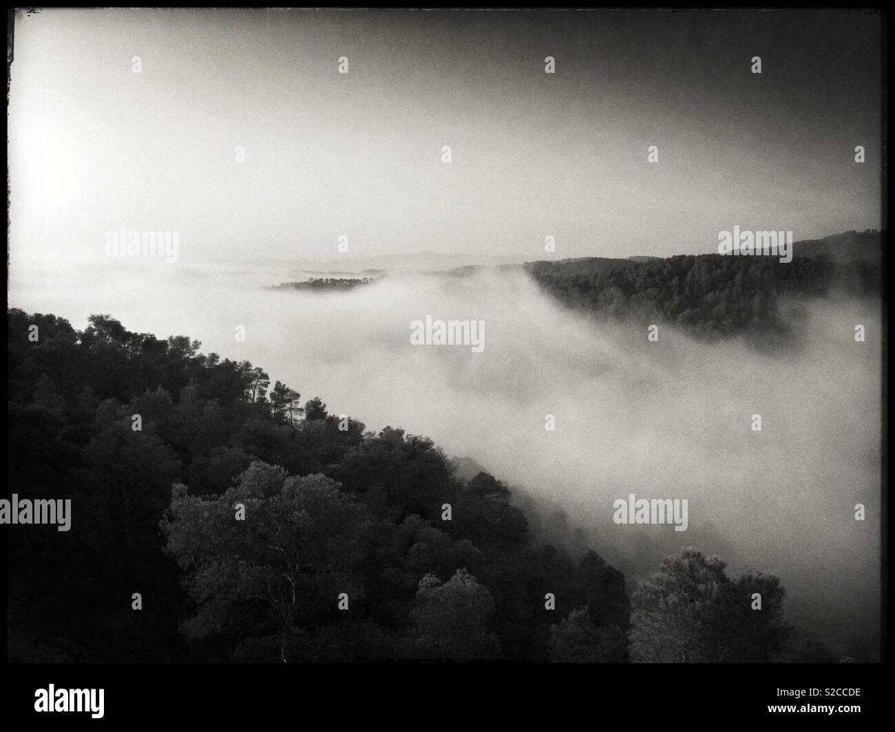 Fog rolls over the mountain, Catalonia, Spain. - Smartphone Captured Stock Image