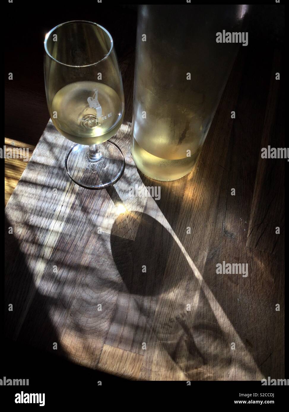 A glass of Viognier with the bottle, Catalonia, Spain. - Smartphone Captured Stock Image