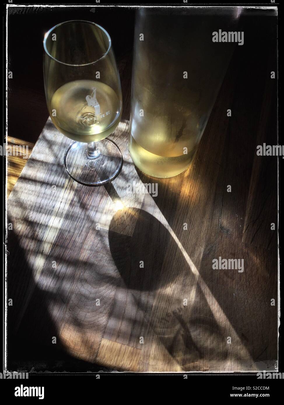 A glass of Viognier with the bottle, Catalonia, Spain. - Smartphone Captured Stock Image