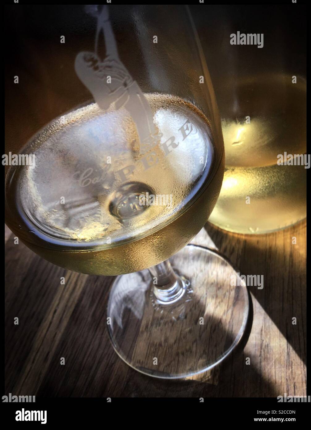 A glass of Viognier with the bottle, Catalonia, Spain. - Smartphone Captured Stock Image