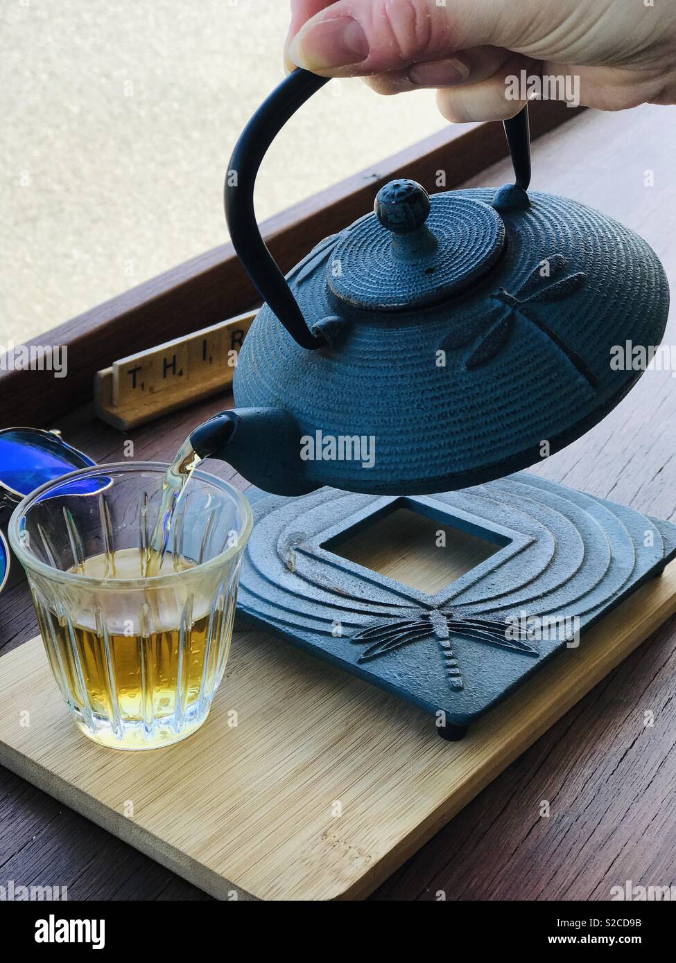 Teapot pouring out tea hires stock photography and images Alamy