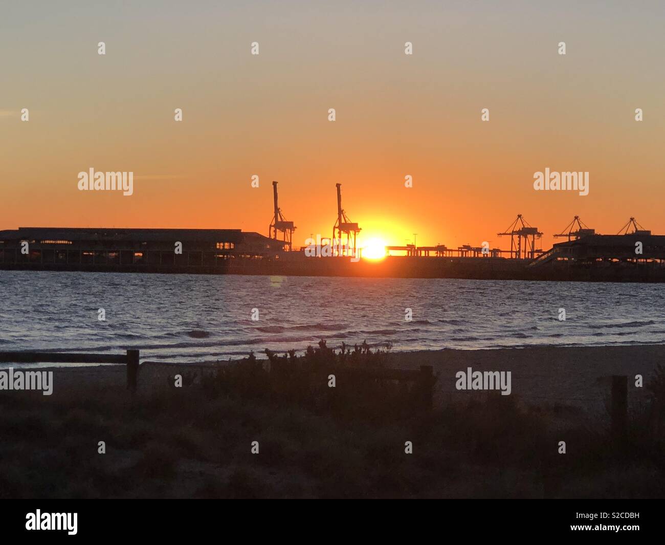 Sunset at the Port Melbourne beach Stock Photo Alamy