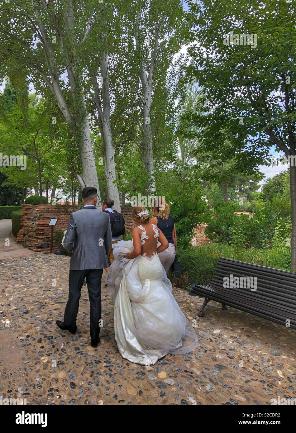 Wedding photos in the gardens of The Alhambra. - Smartphone Captured Stock Image