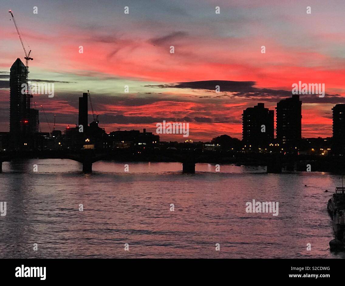 London, UK, 23 October 2018 Sunset over the Thames and Chelsea Wharf Stock Photo