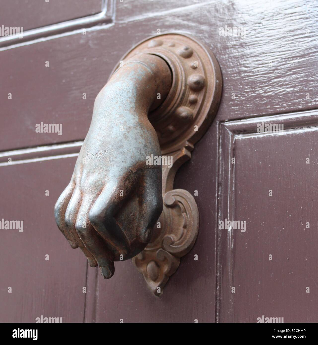 Hand door knocker Stock Photo Alamy