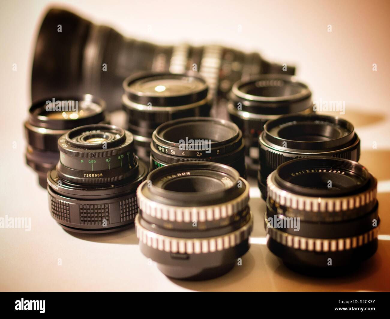 Collection of vintage photo lenses for photography - Smartphone Captured Stock Image