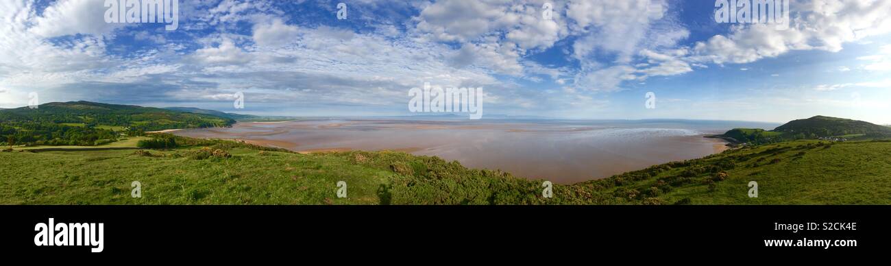 Solway Coast panorama at low tide with a blue sky Stock Photo