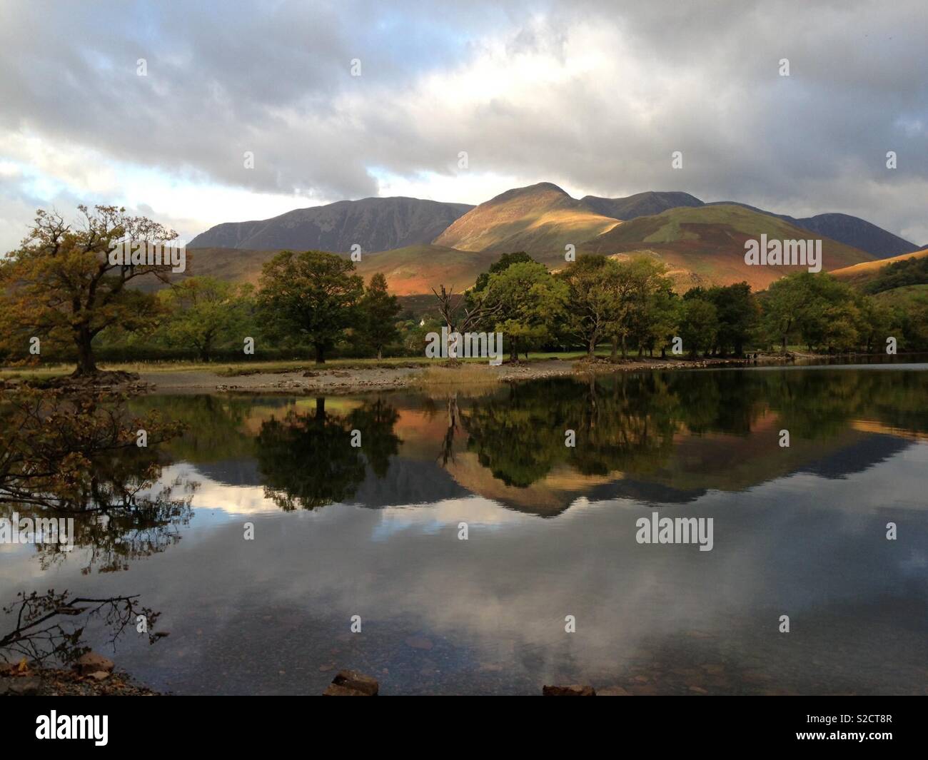 Buttermere mountain lake reflection Stock Photo Alamy