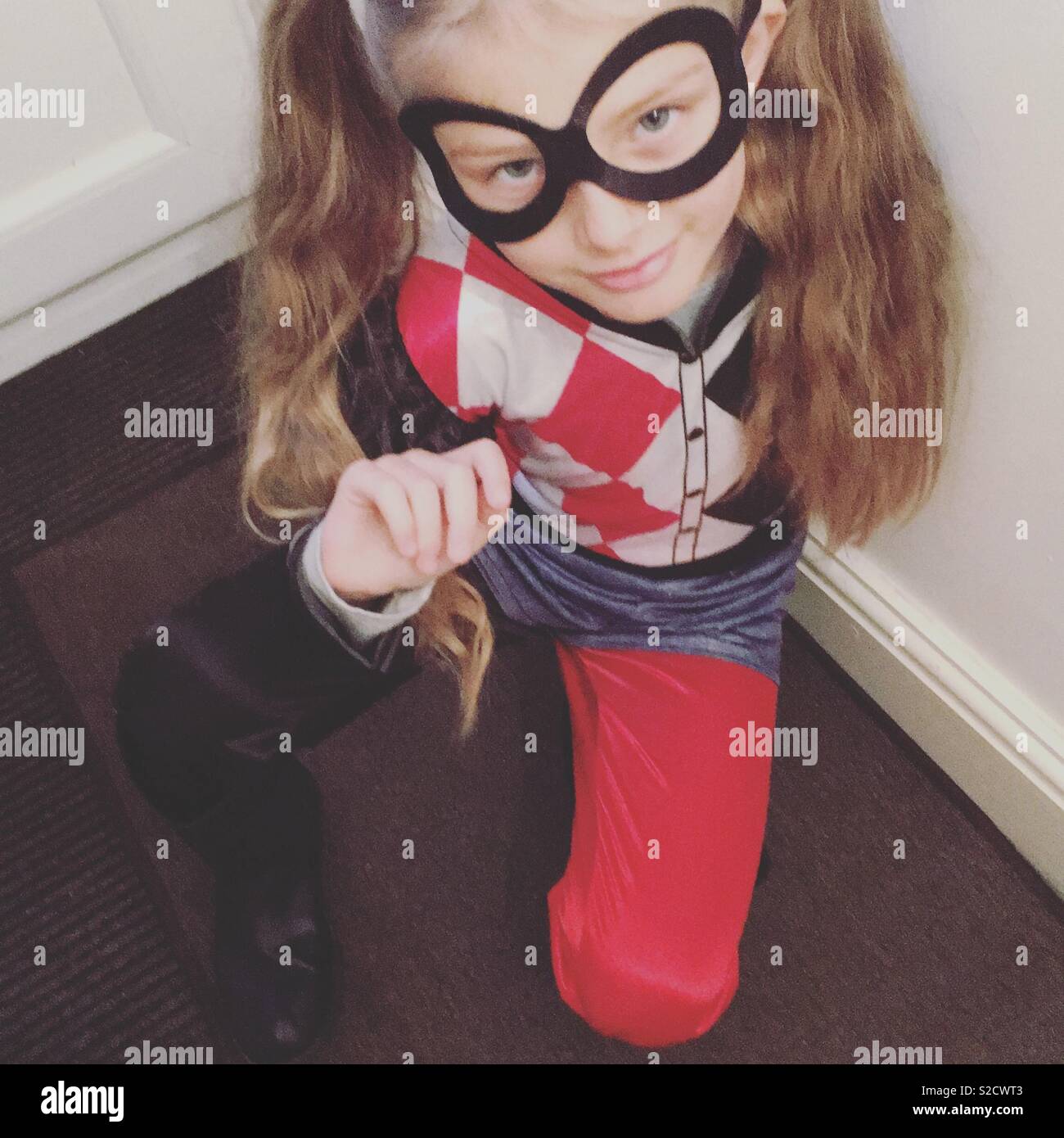 Girl dressed as Harley Quinn for Halloween Stock Photo