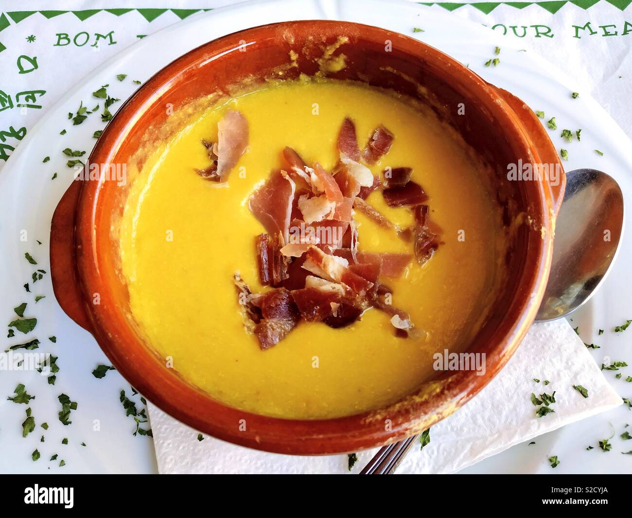 Chickpeas purée with ham. Stock Photo