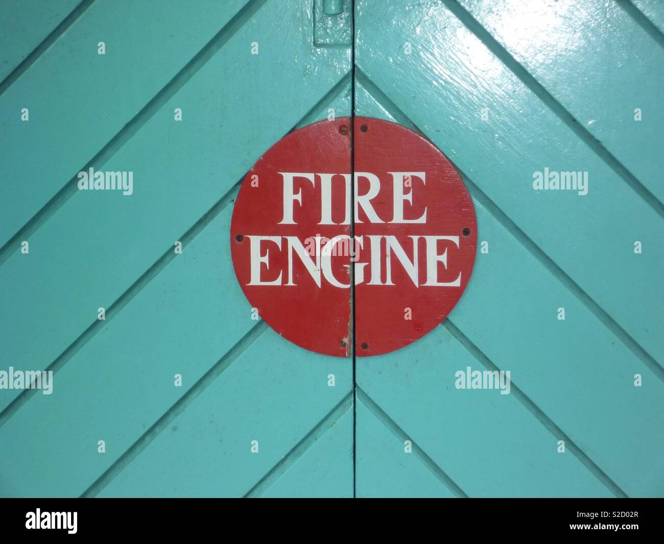Fire engine sign at Portmerion Stock Photo - Alamy