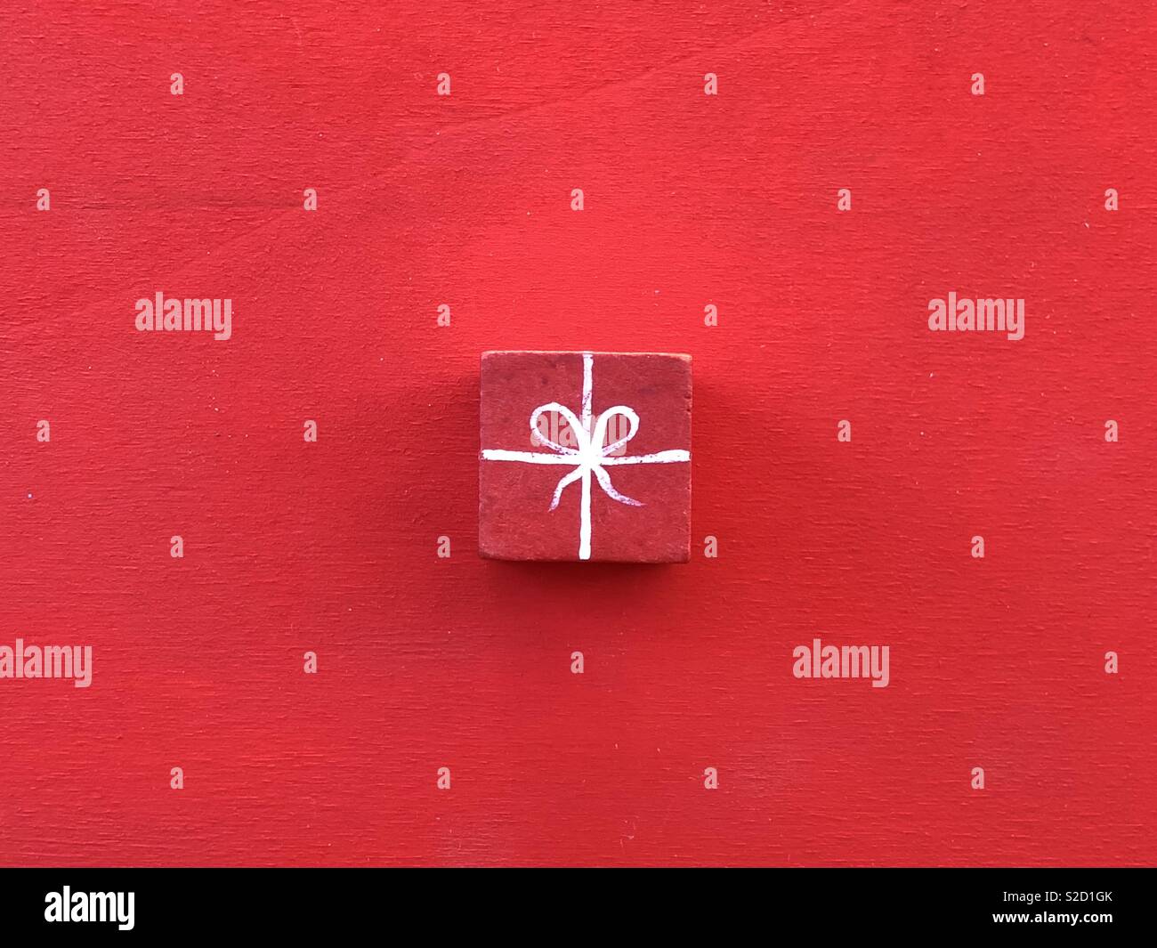 Red gift parcel concept - Smartphone Captured Stock Image