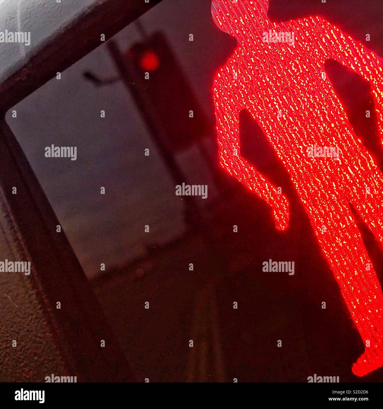 Pedestrian crossing red man do not cross symbol in UK - Smartphone Captured Stock Image