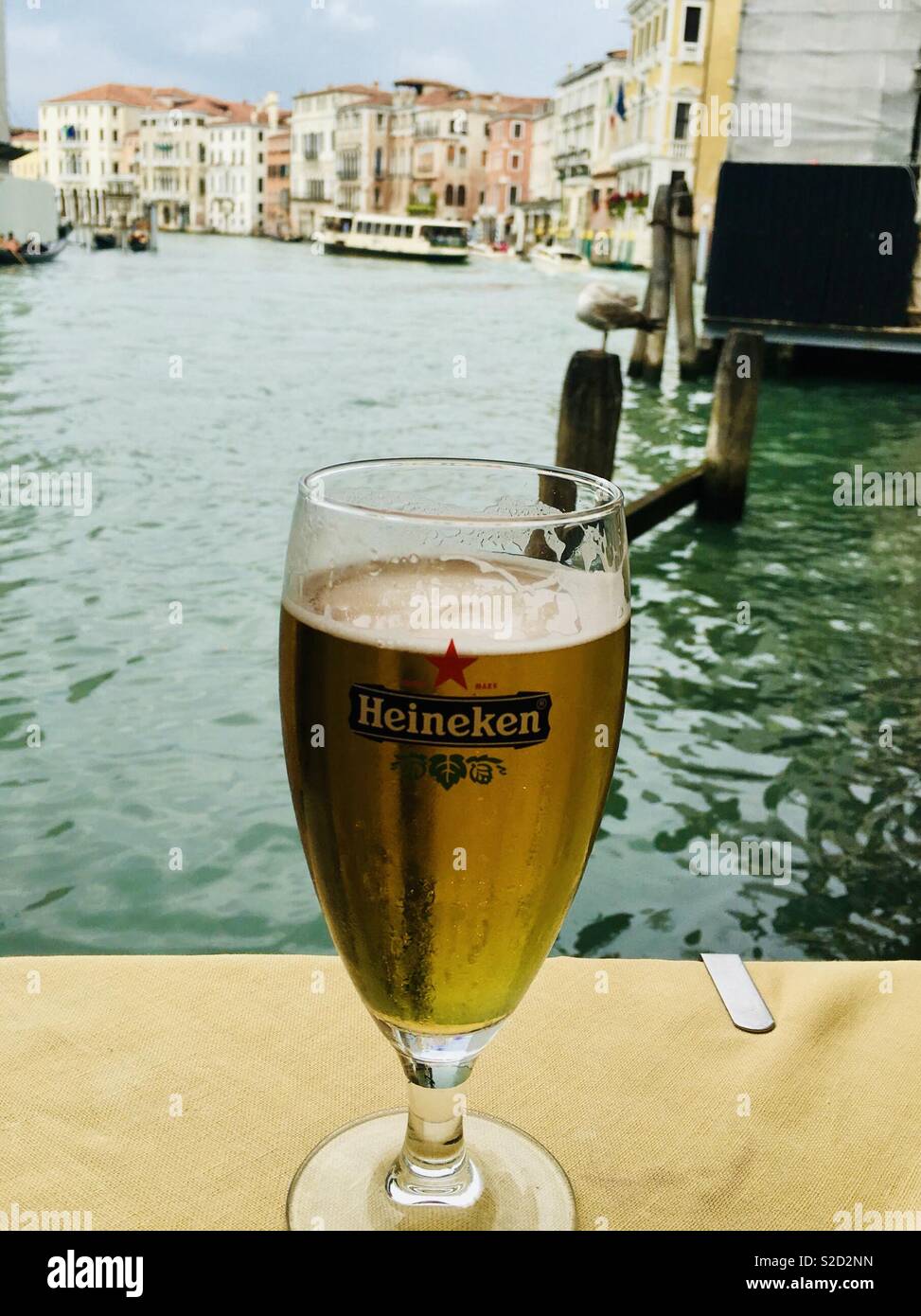 Heineken beer on the Venice canal. Stock Photo