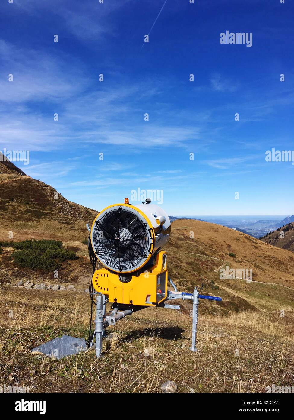 Snow machine on the slopes of the mountain Fellhorn in the German Alps. - Smartphone Captured Stock Image