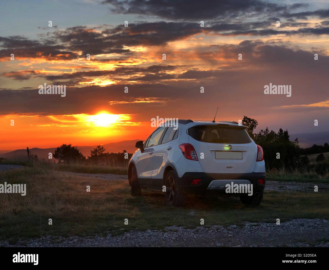 SUV car at sunset Stock Photo