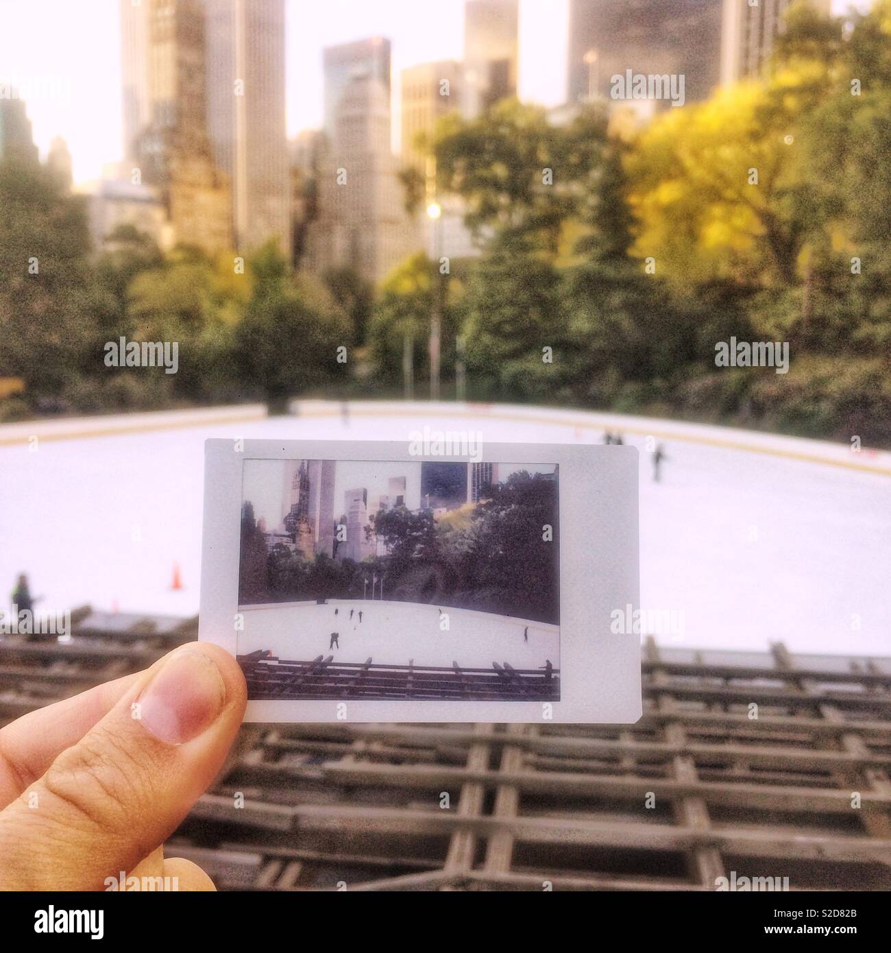 Instant photograph of the Trump Woolman ice rink, Central Park, New York City, United States of America. - Smartphone Captured Stock Image