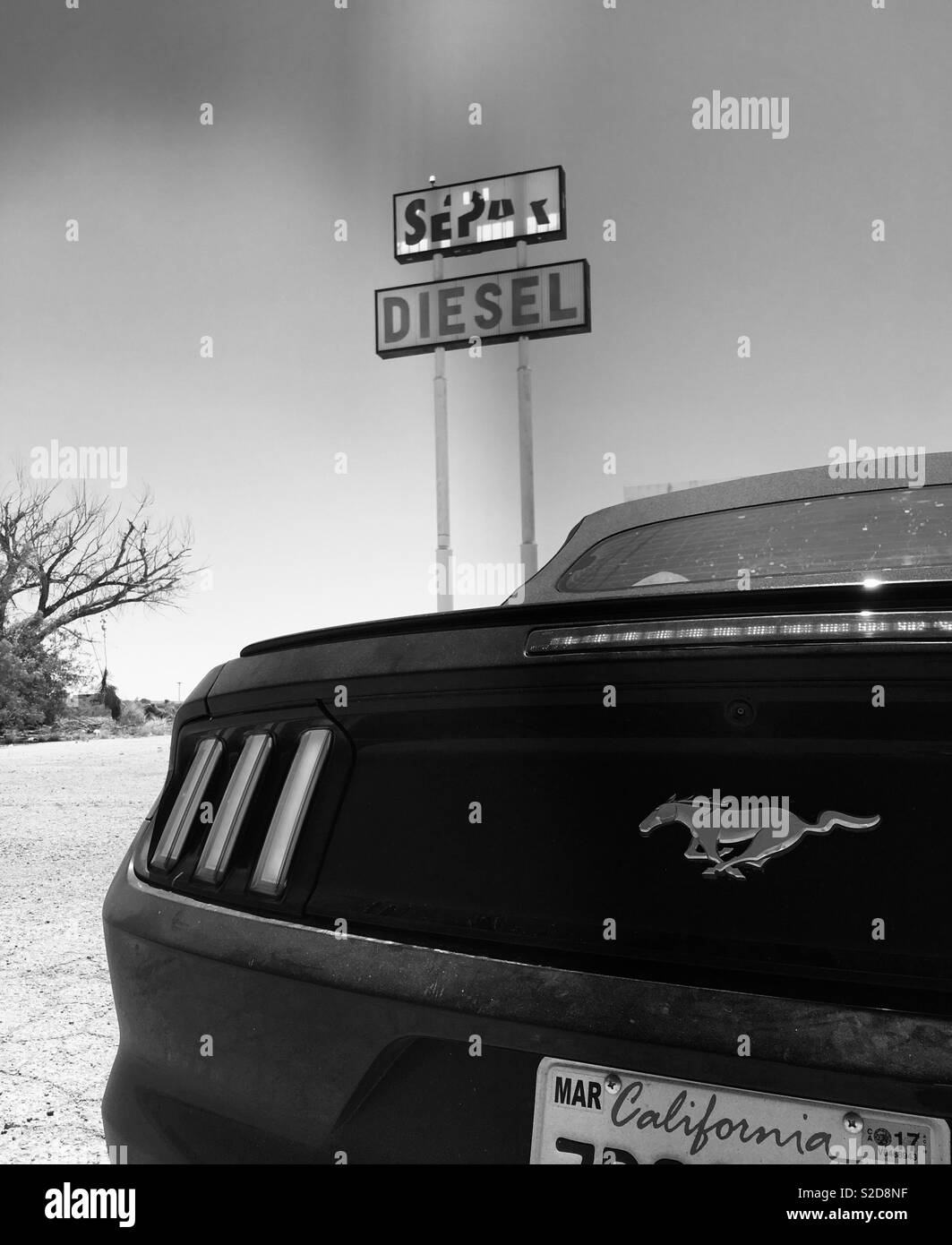 Ford Mustang at abandoned gas station Stock Photo