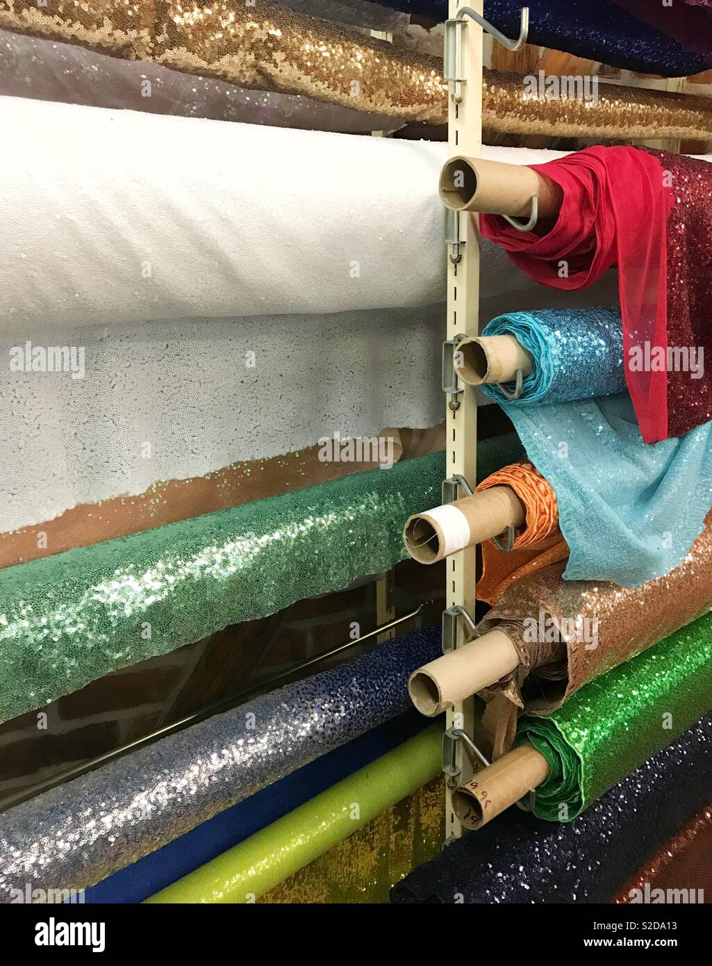 Rolls of sequin fabric Stock Photo