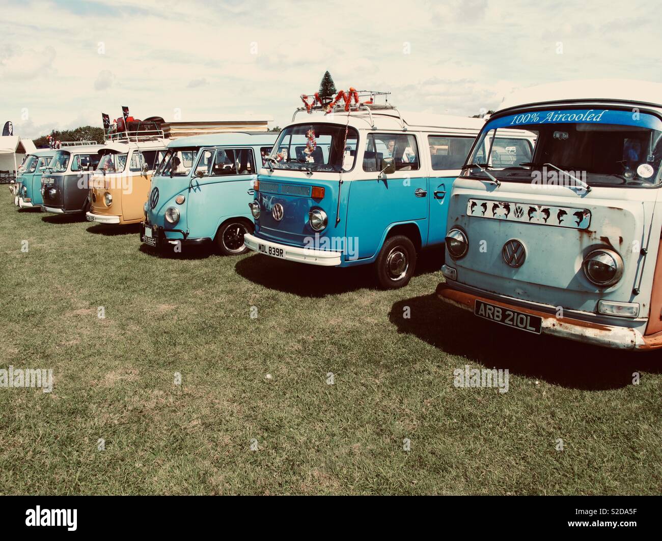 Volkswagen camper van line up at Vw show. Stock Photo