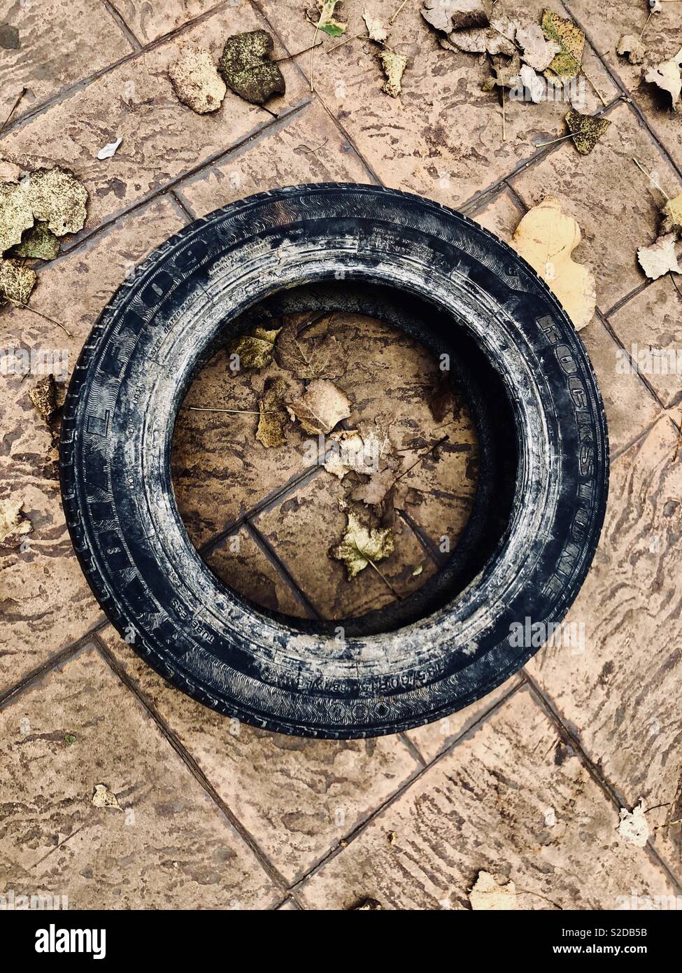 Spare tire in autumn - Smartphone Captured Stock Image