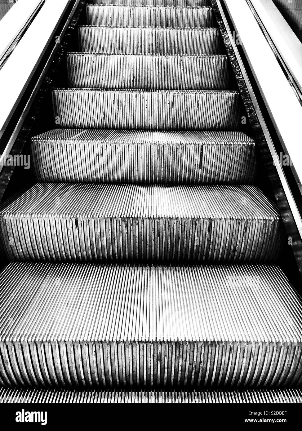 Black and white monochrome image escalator Stock Photo