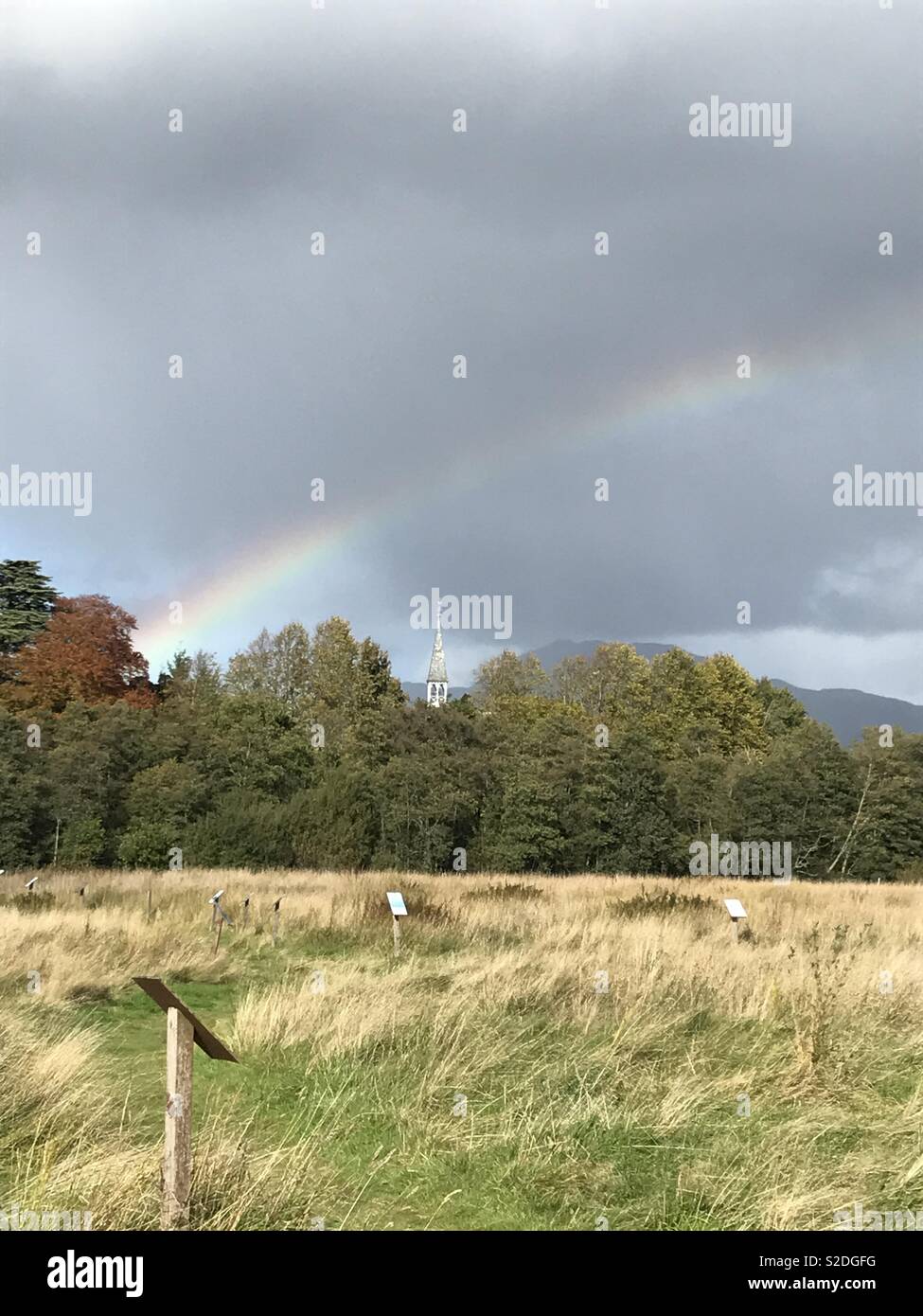 Rainbow and dark clouds hi-res stock photography and images - Alamy