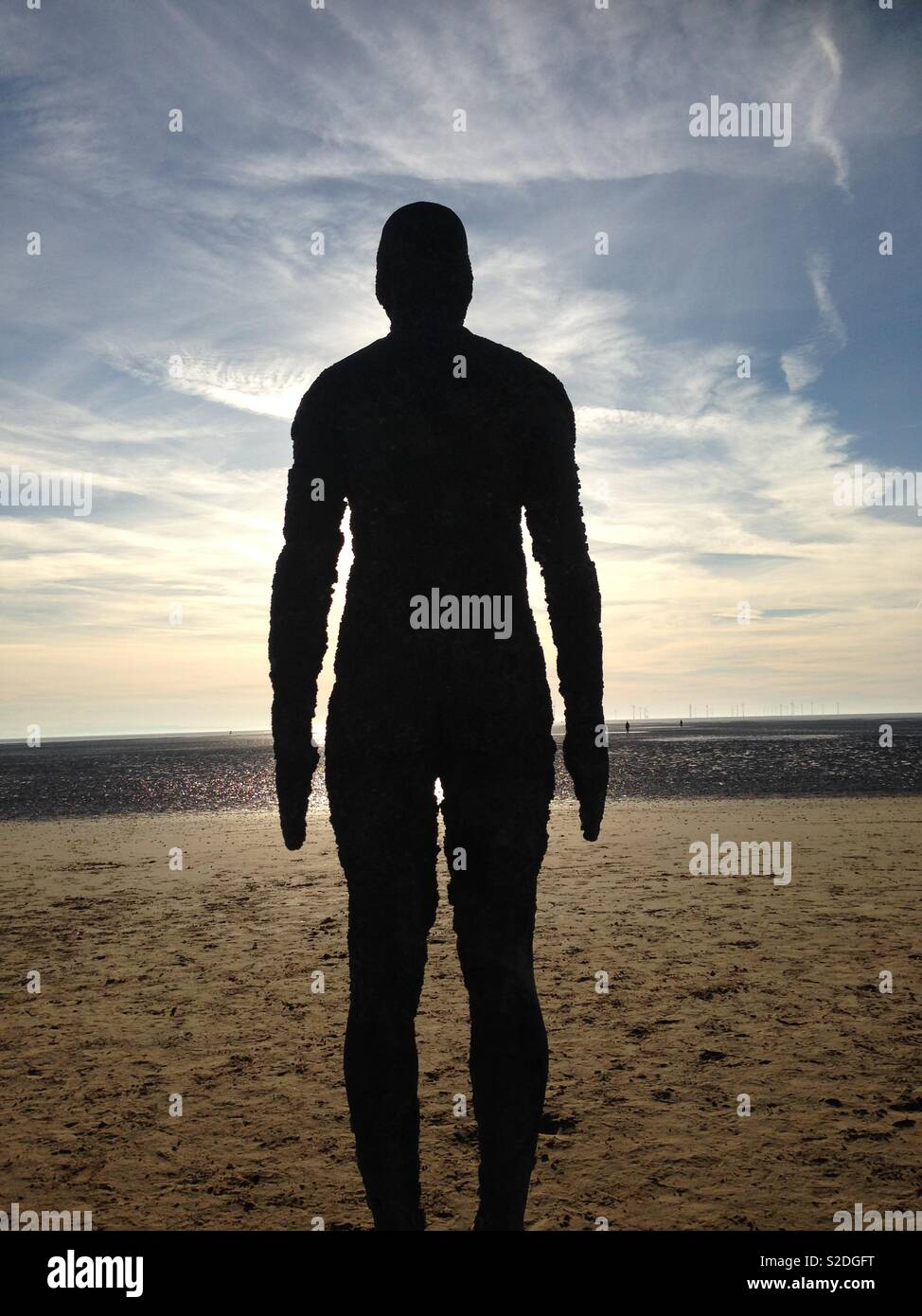 Anthony Gormley statue on Crosby Beach Stock Photo Alamy