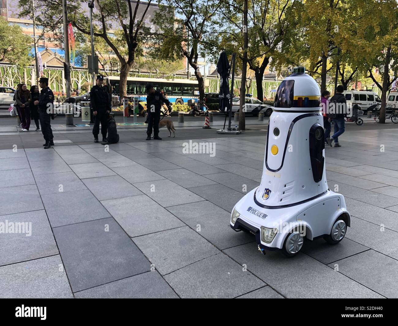 Police robot and police dog in Beijing, China Stock Photo - Alamy