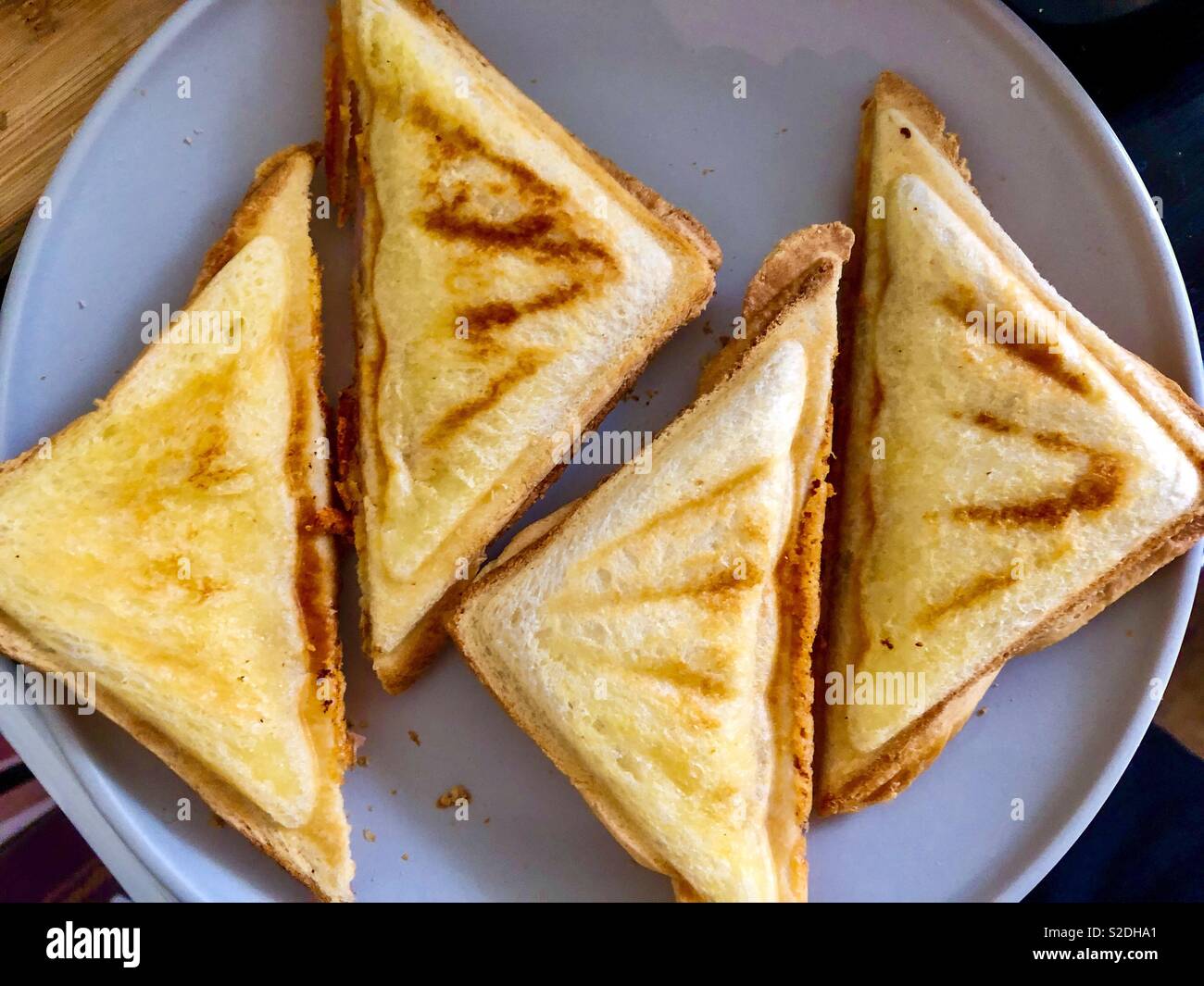 Grilled sandwiches called toasties in Australia. - Smartphone Captured Stock Image