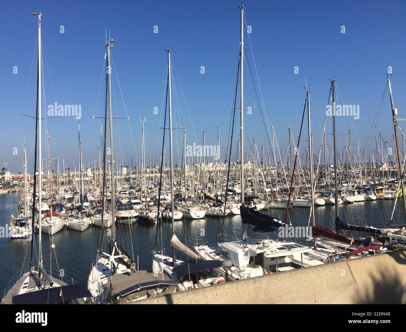 Port Olimpic or Olympic Harbour a marina in Barcelona, Spain on a sunny Autumn afternoon Stock Photo