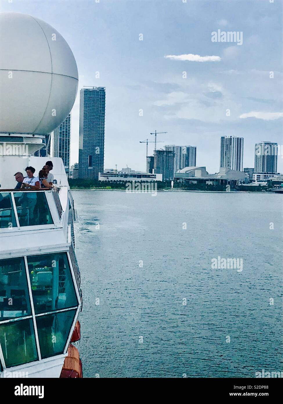 Cruise liner sailing away from the harbour Stock Photo Alamy