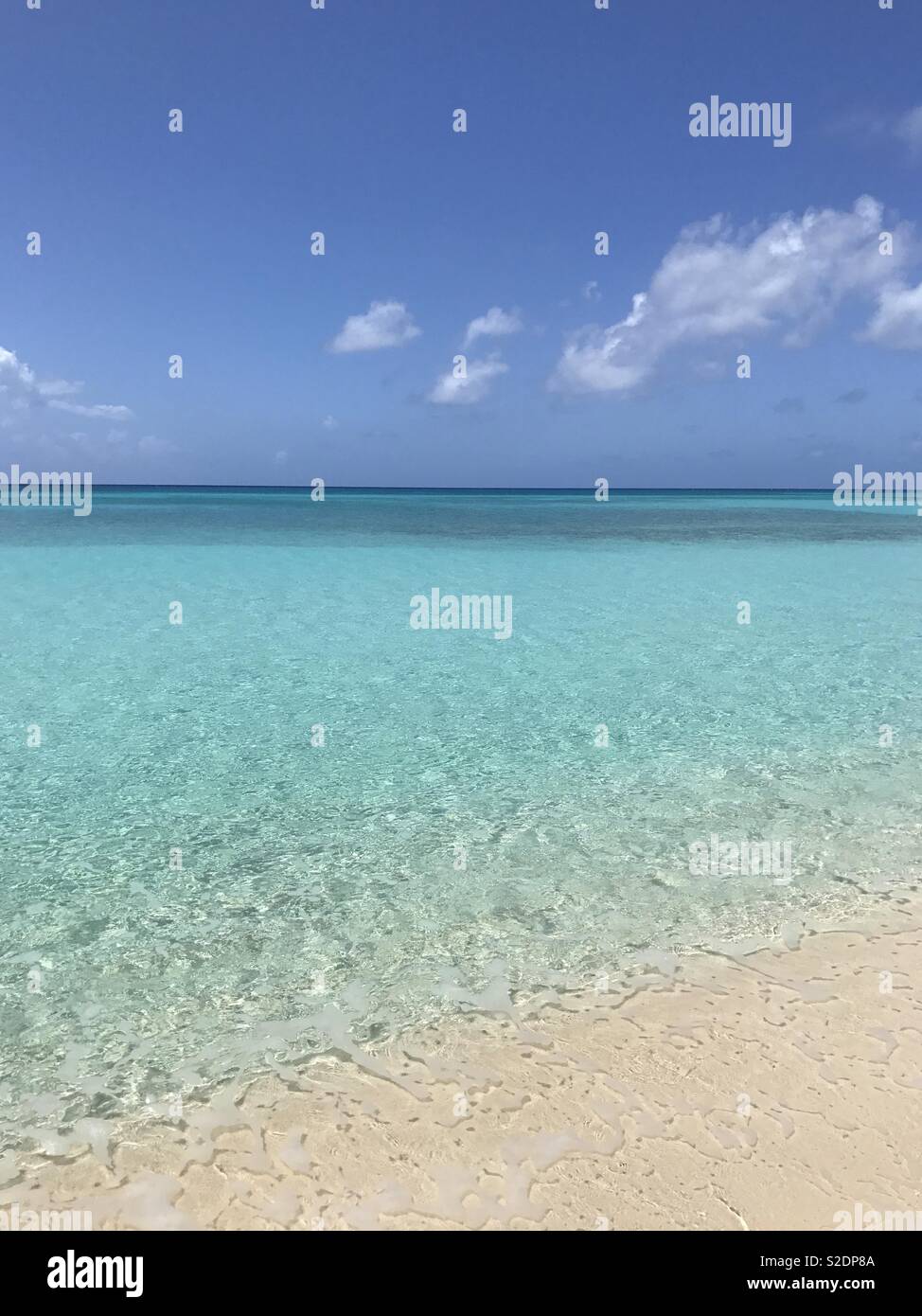 Clear Blue Caribbean - Seven Mile Beach, Grand Cayman Stock Photo