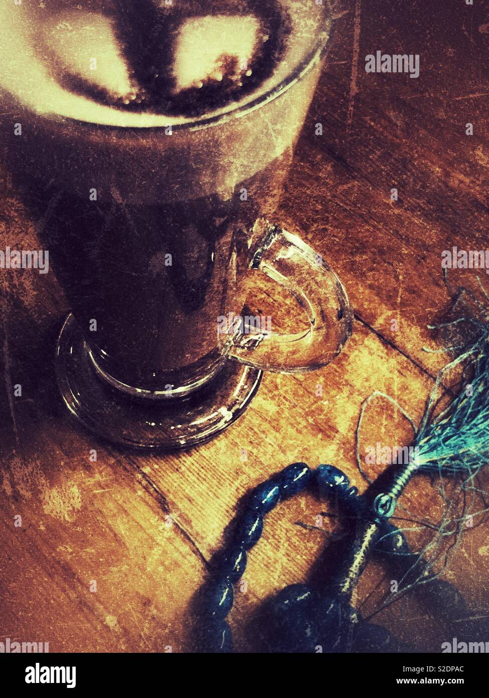 Rosary and a hot drink - Smartphone Captured Stock Image
