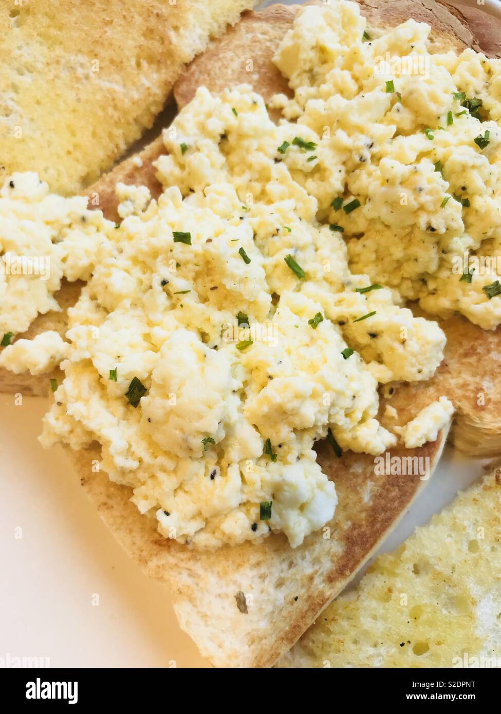 Scrambled egg on toast Stock Photo - Alamy