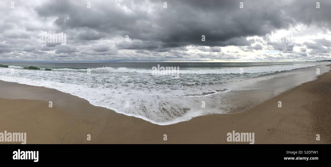Storm clouds and ocean wave panorama Stock Photo