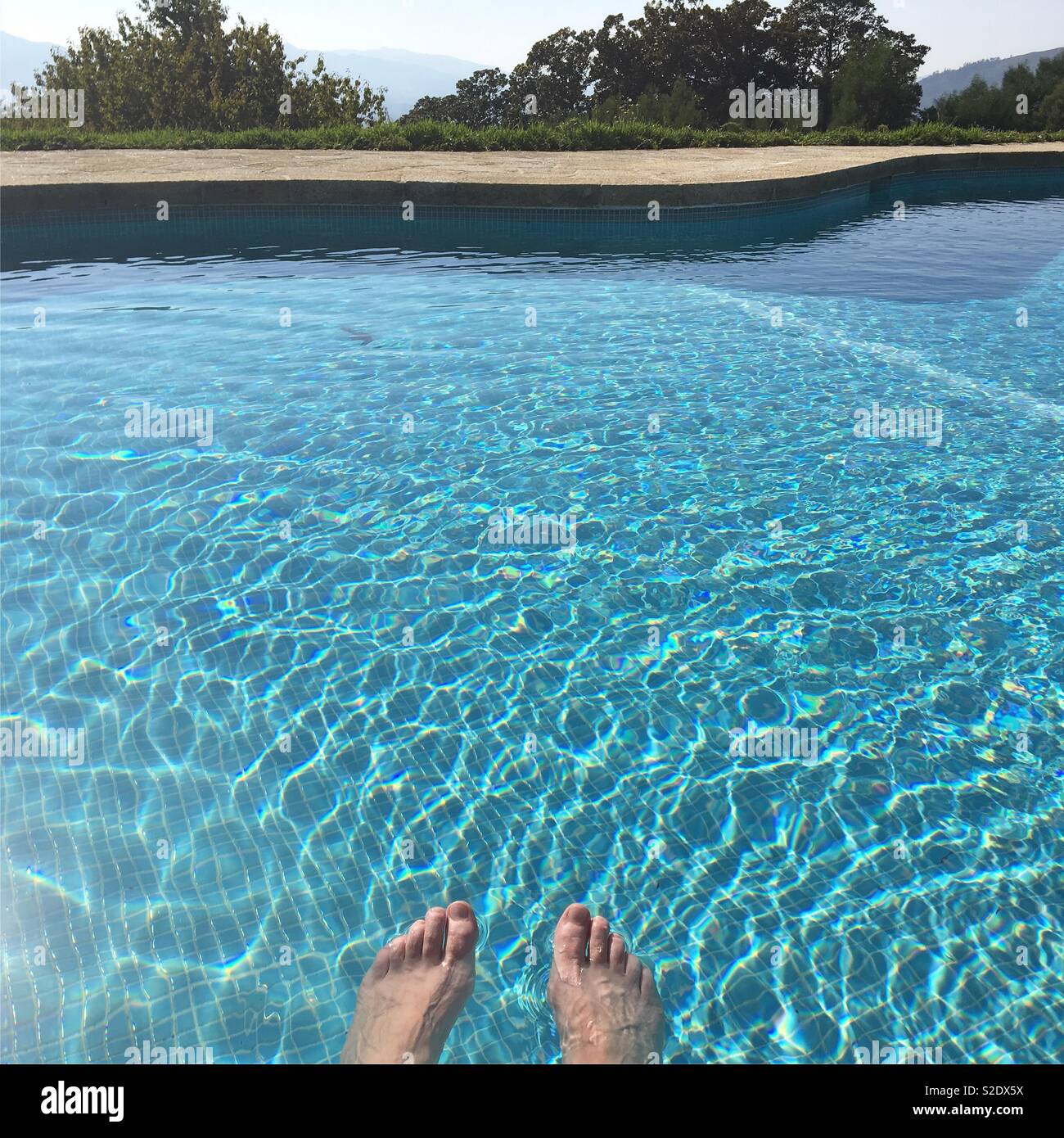 Relaxation at the swimming pool - Smartphone Captured Stock Image