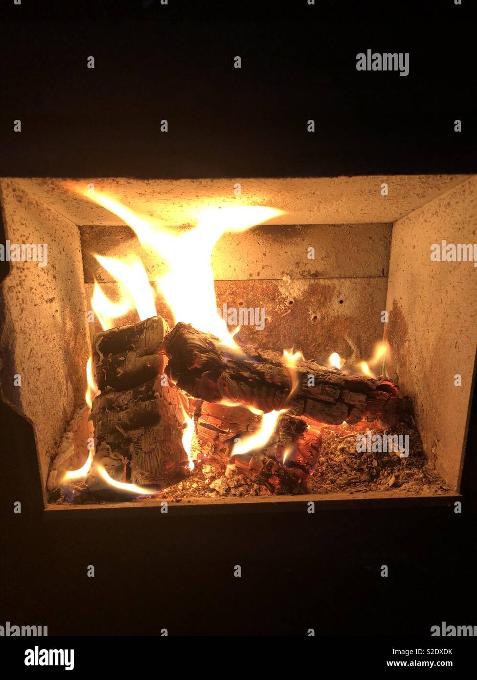 Fire burning in a log burner close up Stock Photo