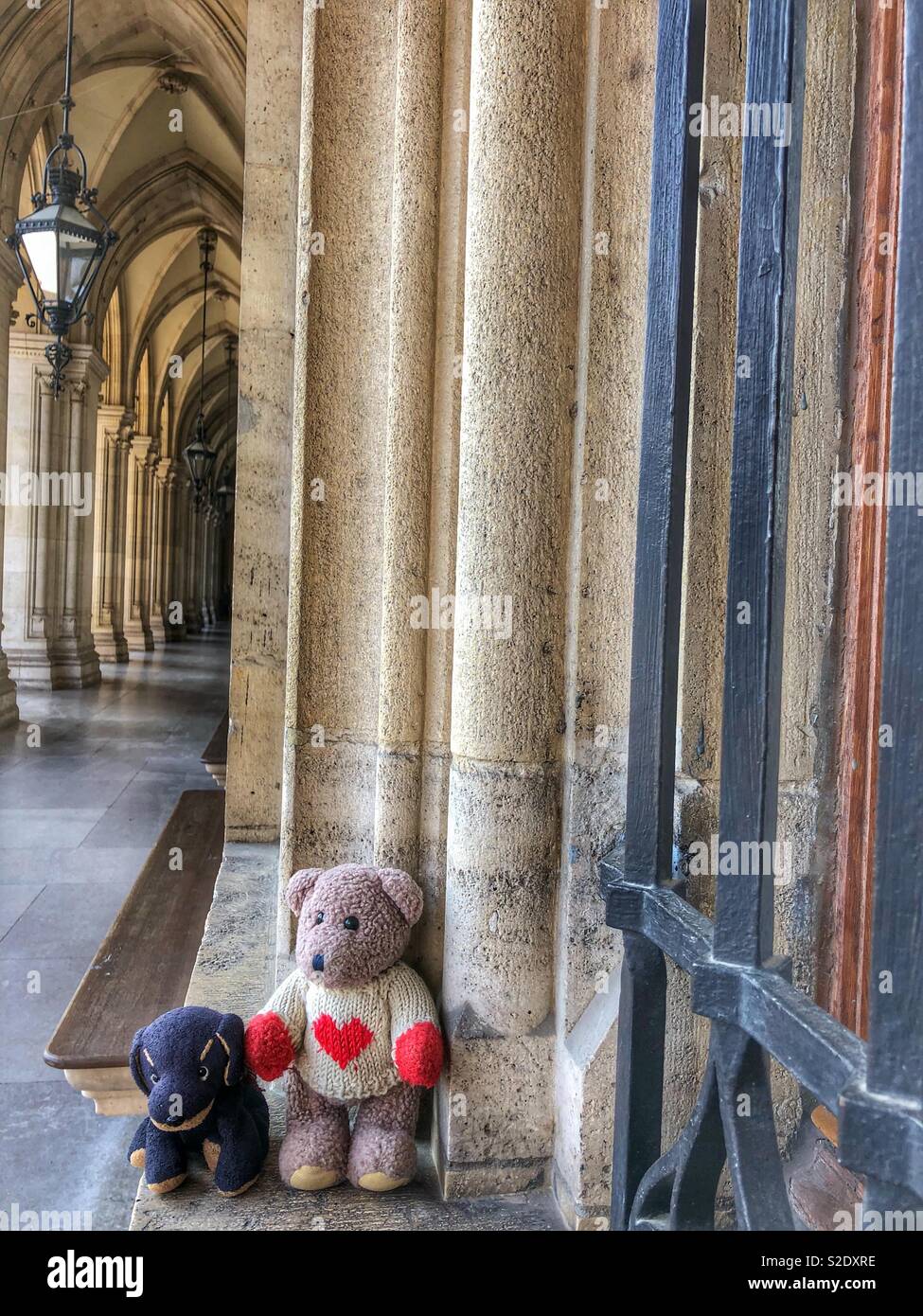 Stuffed animals relaxing at Vienna’s Rathaus, city hall. - Smartphone Captured Stock Image