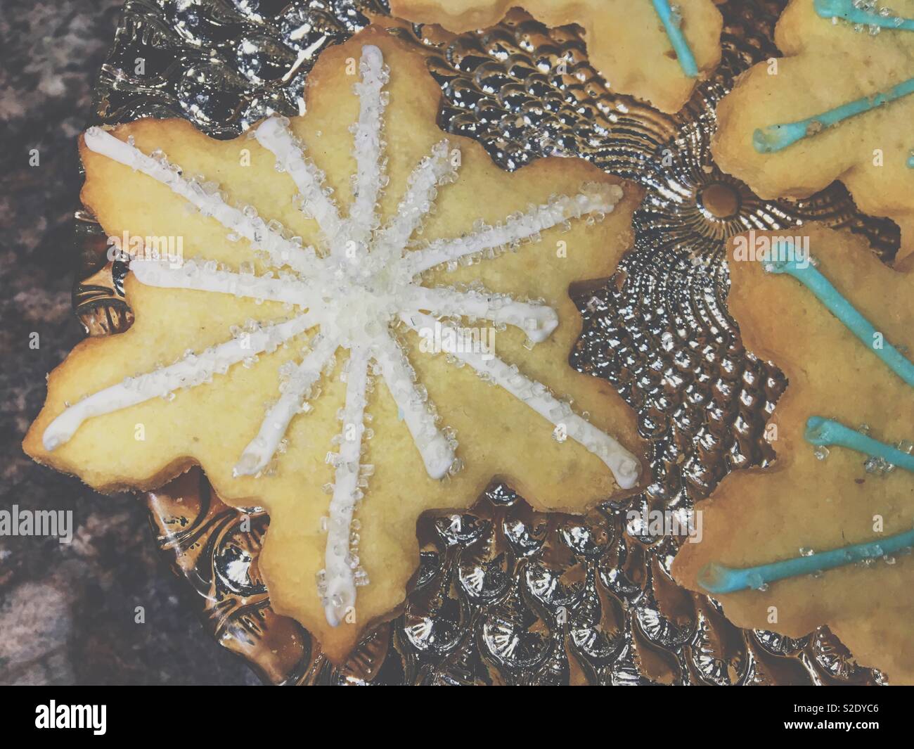 Close up of snowflake shaped Christmas cookie. Stock Photo