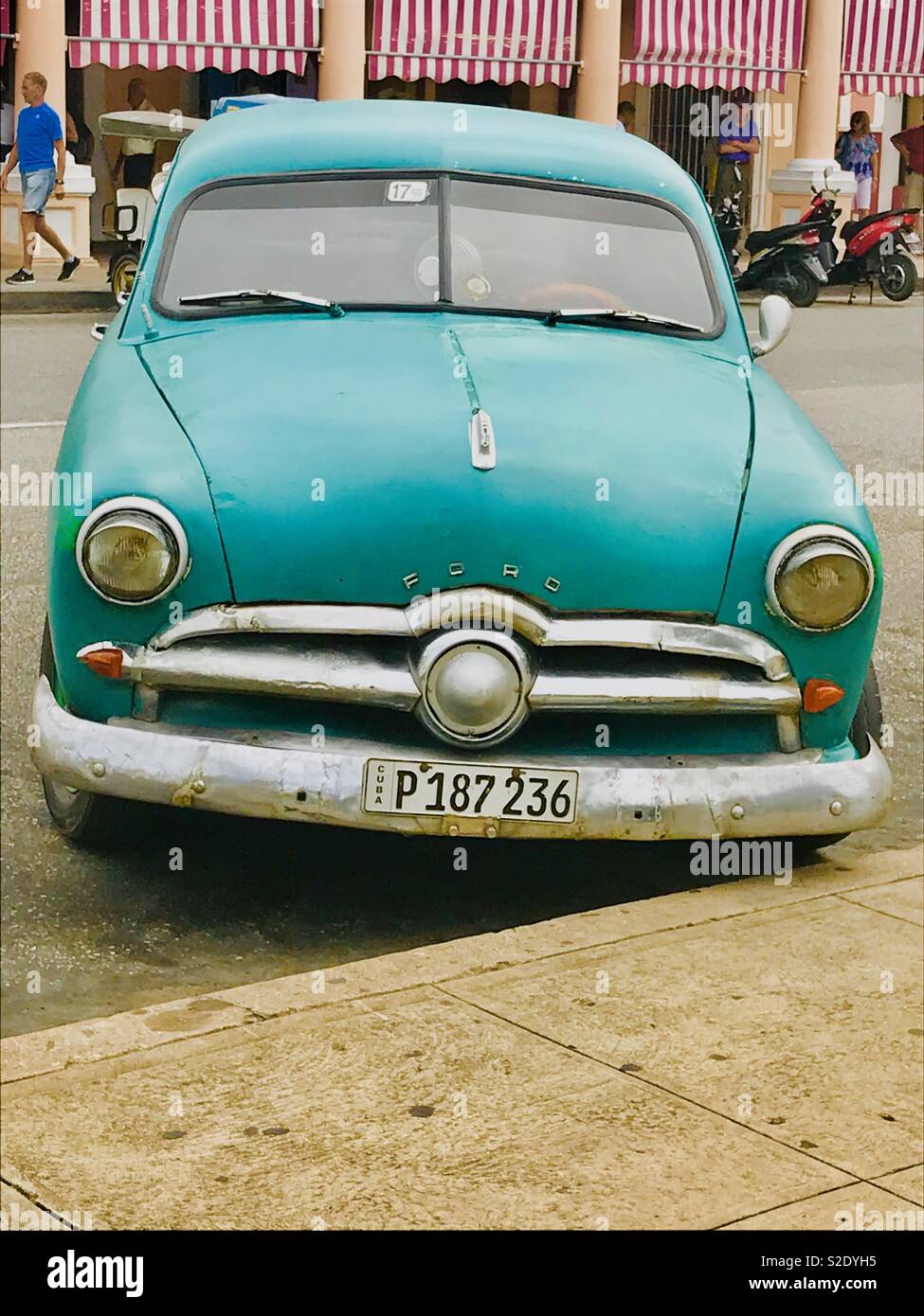 Old bright turquoise Ford classic car in Cienfuegos Cuba Stock Photo