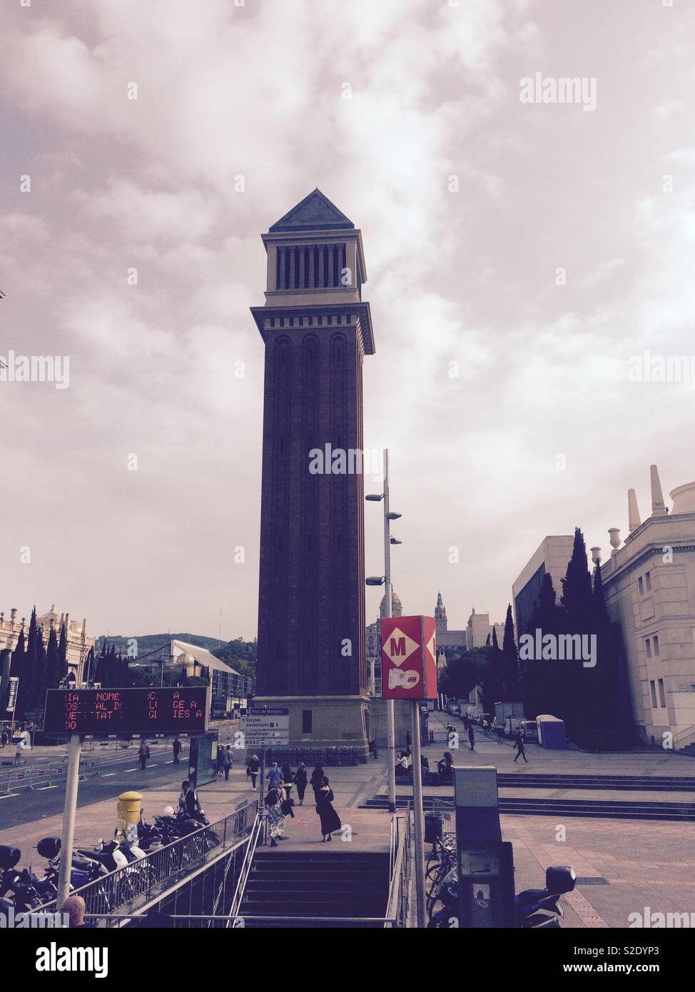 One of the Venetian Towers and the metro station of Parc de Montjuic in Barcelona Spain Stock Photo