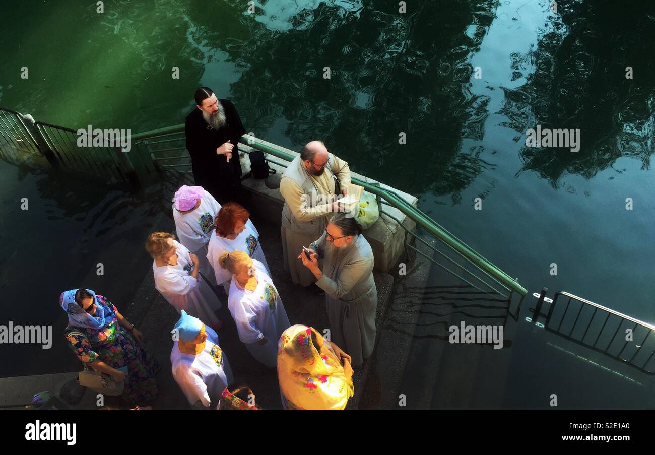 Russian pilgrims at the baptism site at the Jordan river in Israel. - Smartphone Captured Stock Image