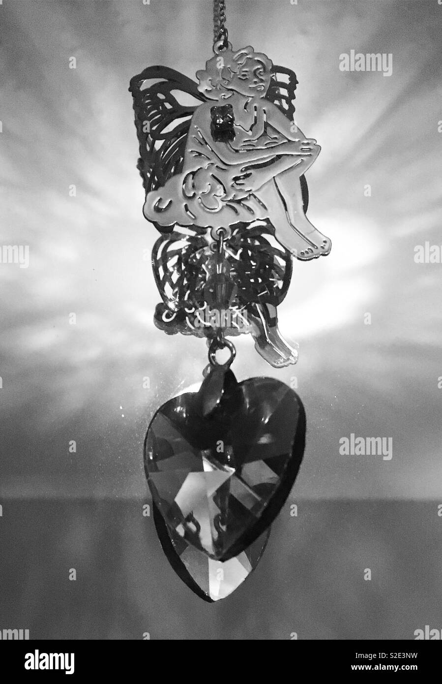 Angel sun catcher in monochrome - Smartphone Captured Stock Image