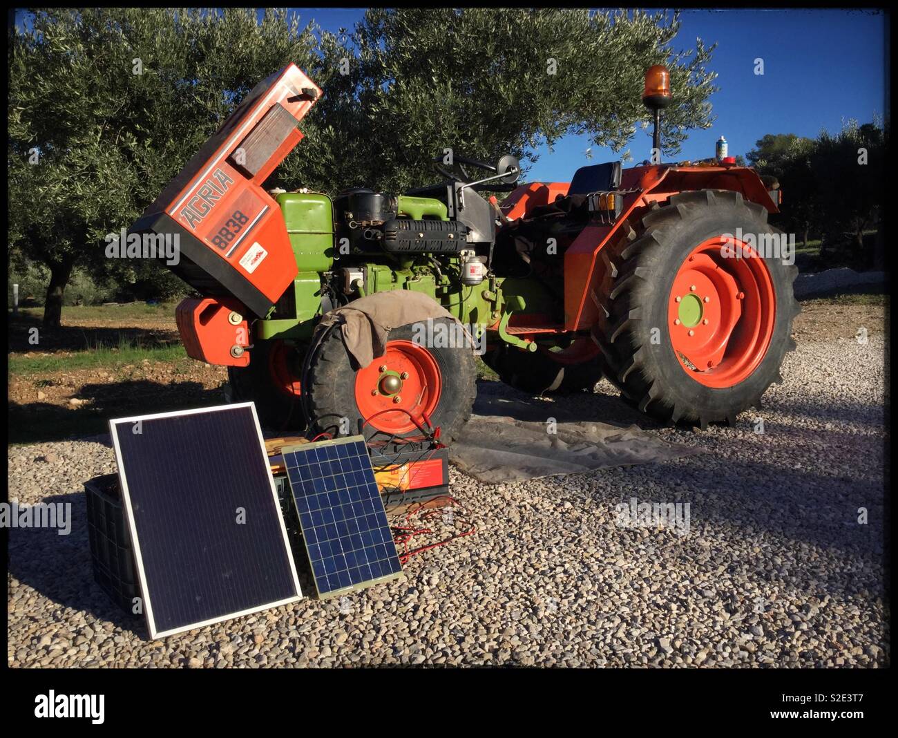 Fixing a tractor off-grid, Catalonia, Spain. - Smartphone Captured Stock Image