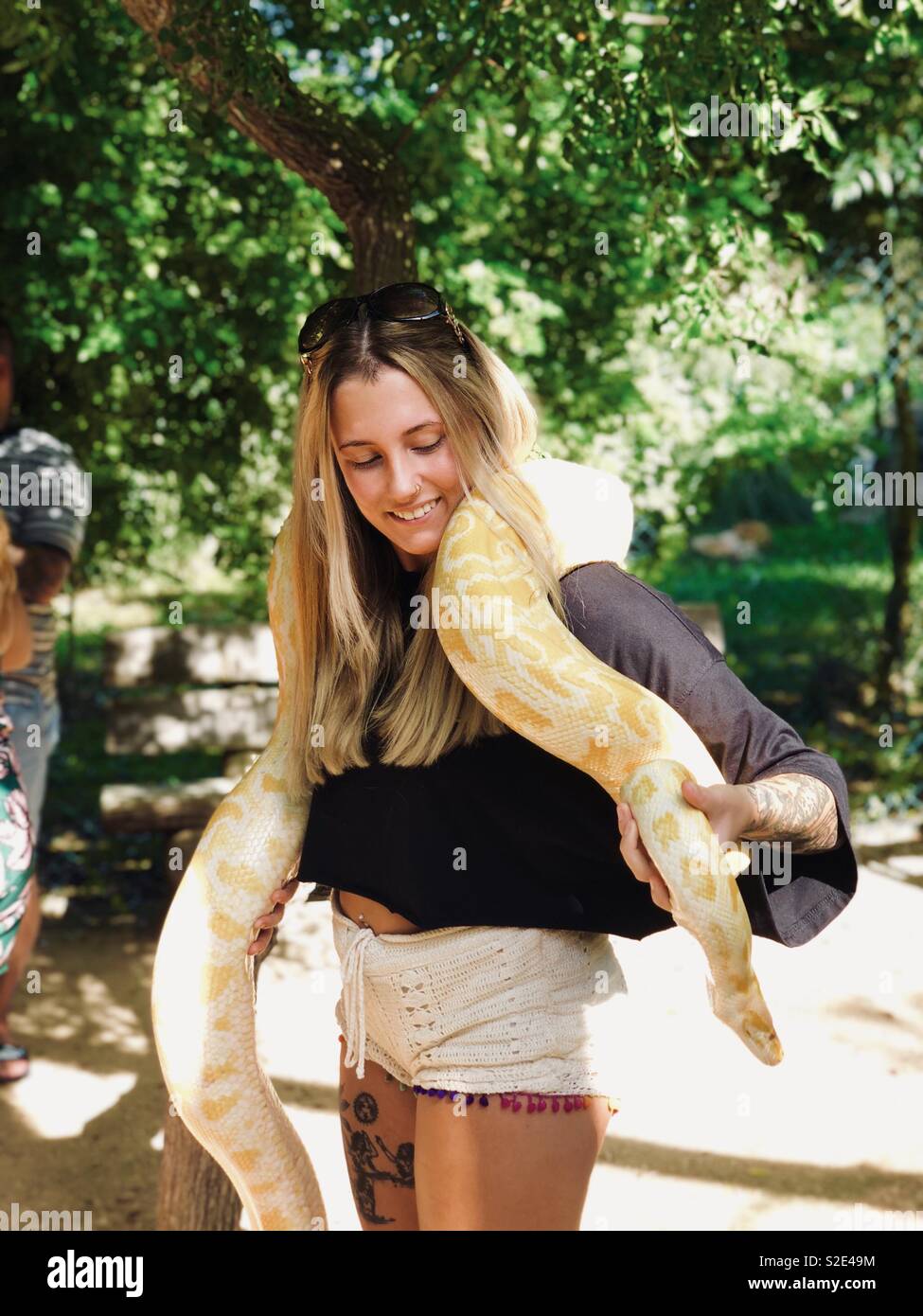 Girl with a snake Stock Photo