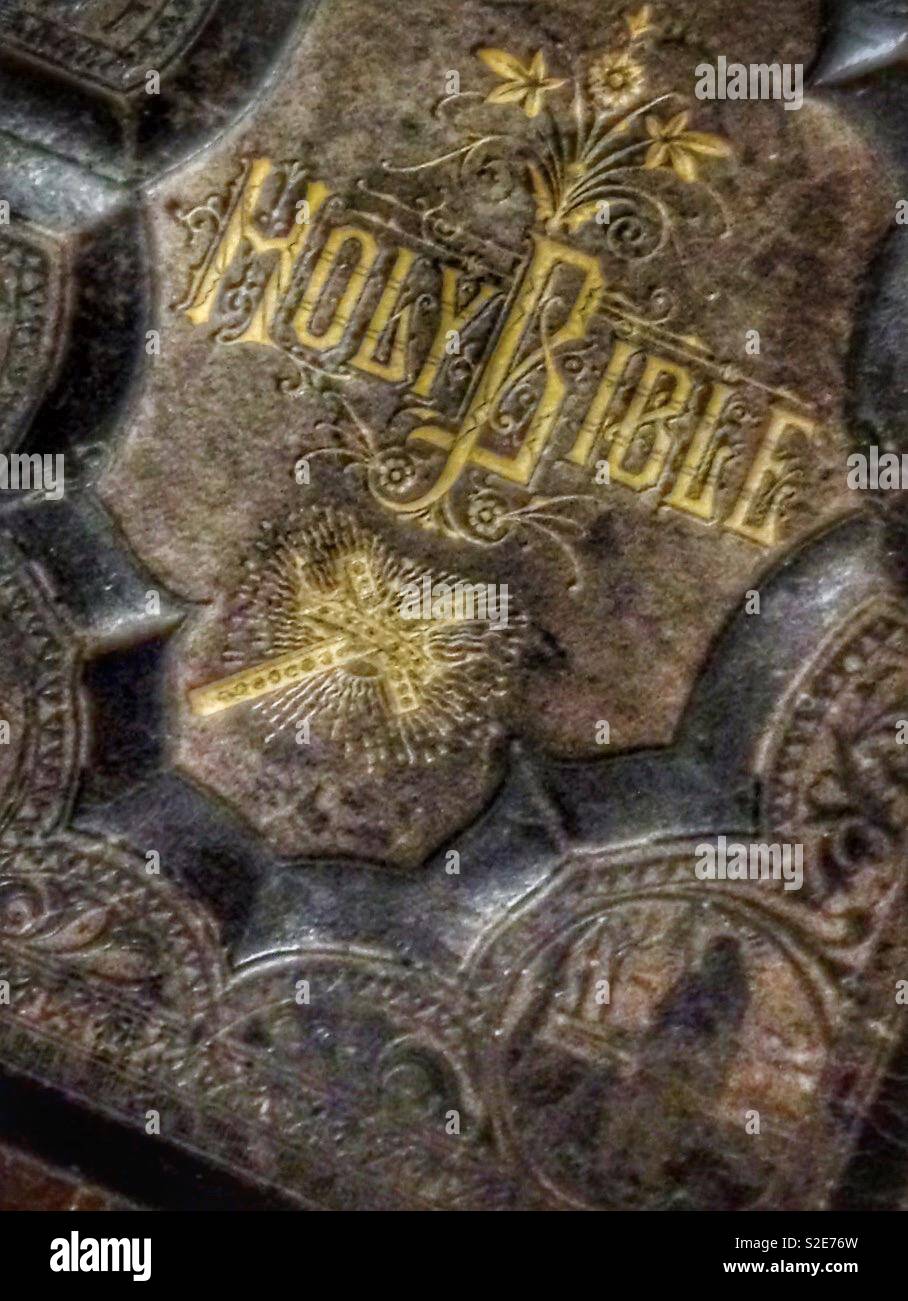 Old ornate family Bible with gilt script - Smartphone Captured Stock Image
